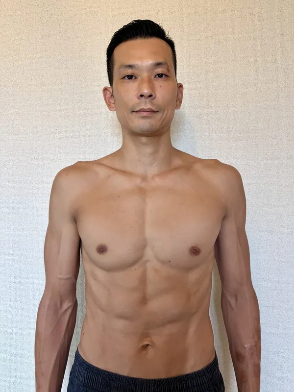 Tatsuya Ozu photographed at home in July 2026, after ten months of recorded weigh-ins